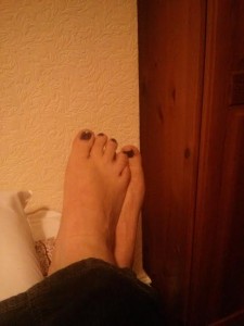 here is a picture of my feet that I sent to a man on the internet. Please do not judge me by the decor - it is not my flat