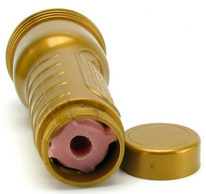 Reverse image of the Fleshlight stamina training unit - a gold case in the shape of a flashlight with the unscrewable bottom removed so you can see a glimpse of pink squishy material inside