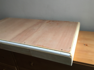 Image of whole spanking bench top complete with nailed on dowels