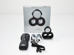 Silver box packaging for JETT plus wires, remote, two silver bullets and wires that make up the Hot Octopuss JETT sex toy