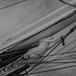 Pirate erotica - Black and white image of the prow of a ship with a bust of a woman on it