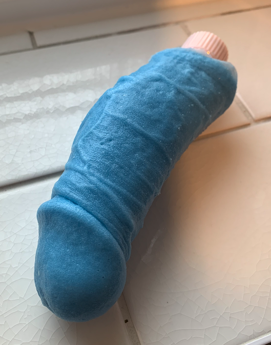 Blue veined silicone vibrator that is an accurate representation of a real life dick