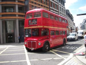 Old London Routemaster bus showing direction to Tower Hill and number T15