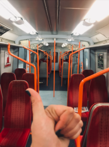 Mainline rail carriage with red moquette and orange bars