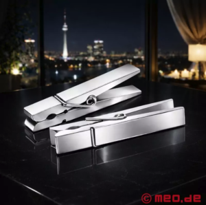 Two tiny silver pegs